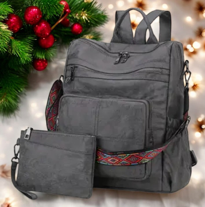 Don't Travel Alone, Backpack with Guitar Strap and Bonus Wristlet